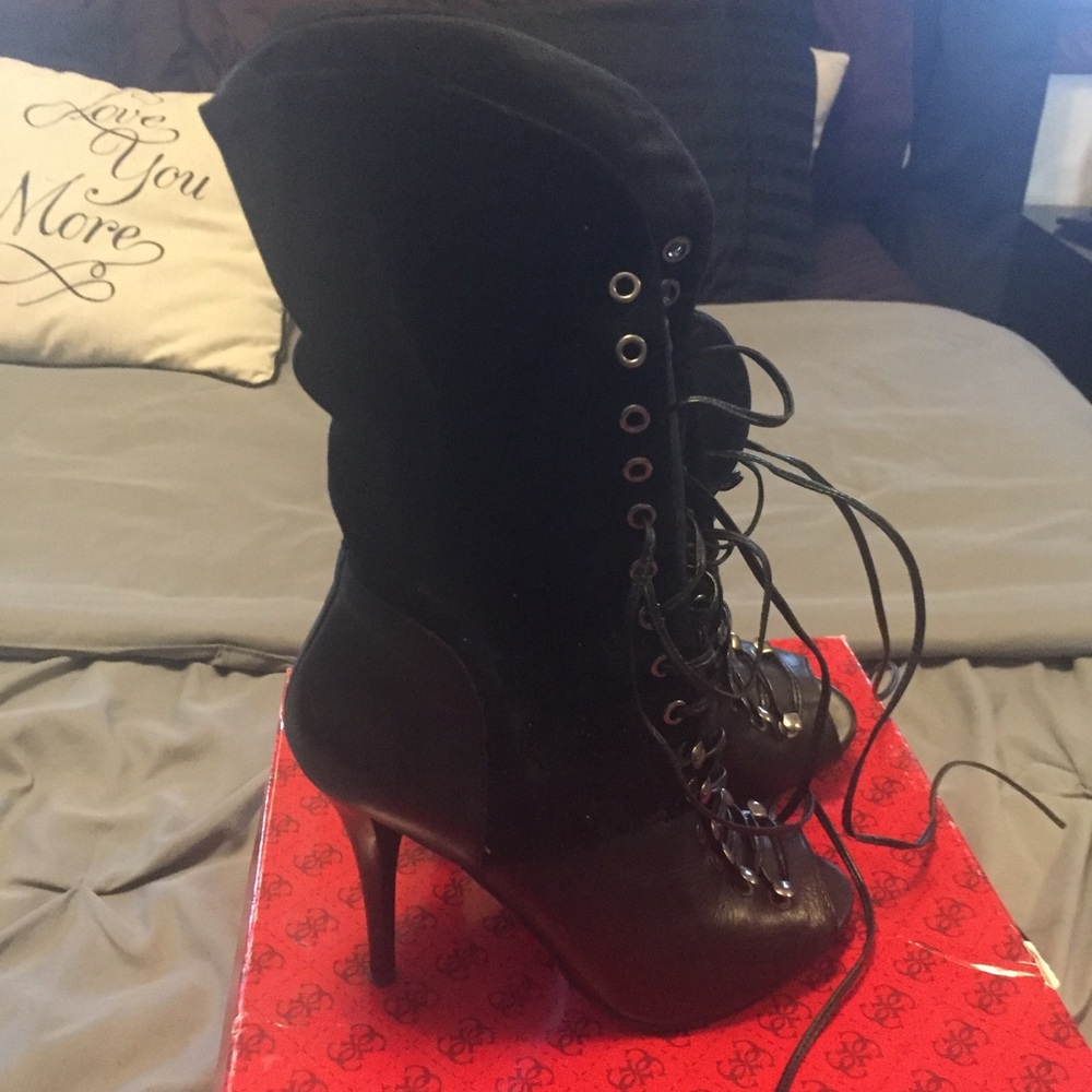 Guess peep toe lace up boots.